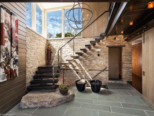 Contemporary staircase by Kistler & Knapp Builders